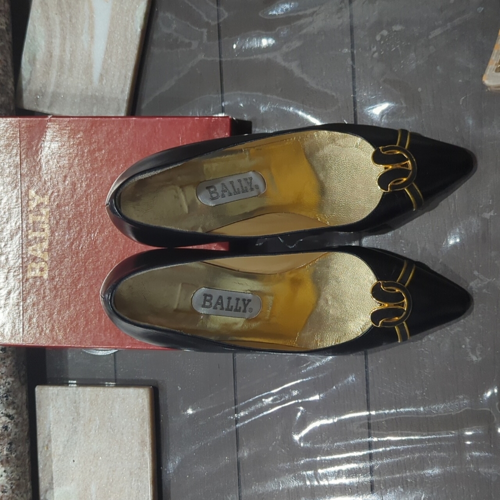 Bally black and gold pumps